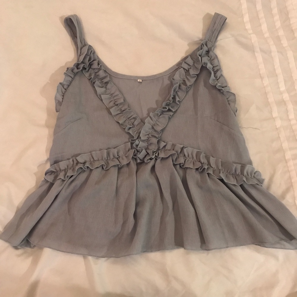 Light blue ruffled tank top
